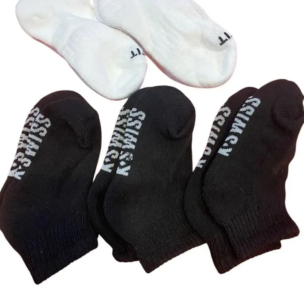 Nike 2 pair white and 3 pair of K- Swiss socks